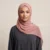 Fabric detail and rolled hem of the pink square silk chiffon hijab Riley Collection