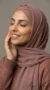 Rosy brown cross-over tube underscarf
