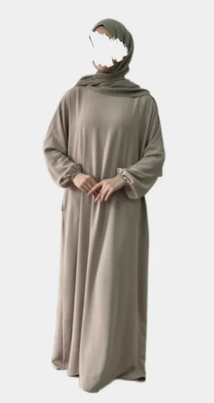 Simple long beige women abaya with wide elastic sleeves: The epitome of grace and refinement