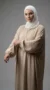 Beige Simple Long and Loose Abaya with Elastic Sleeves - Studio Photo - Model Style: Hijabi