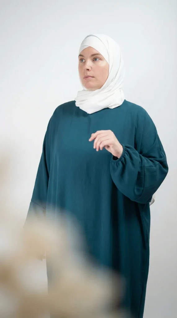 Teal Simple Long and Loose Abaya with Elastic Sleeves - Studio Photo - Model Style: Hijabi